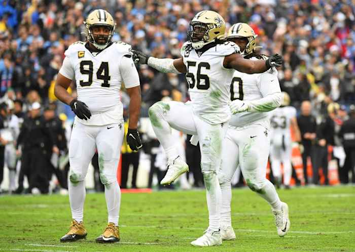 Saints defensive end Cameron Jordan (94) and linebacker Demario Davis (56) celebrate after a sack. Mandatory Credit: Christopher Hanewinckel-USA TODAY Sports